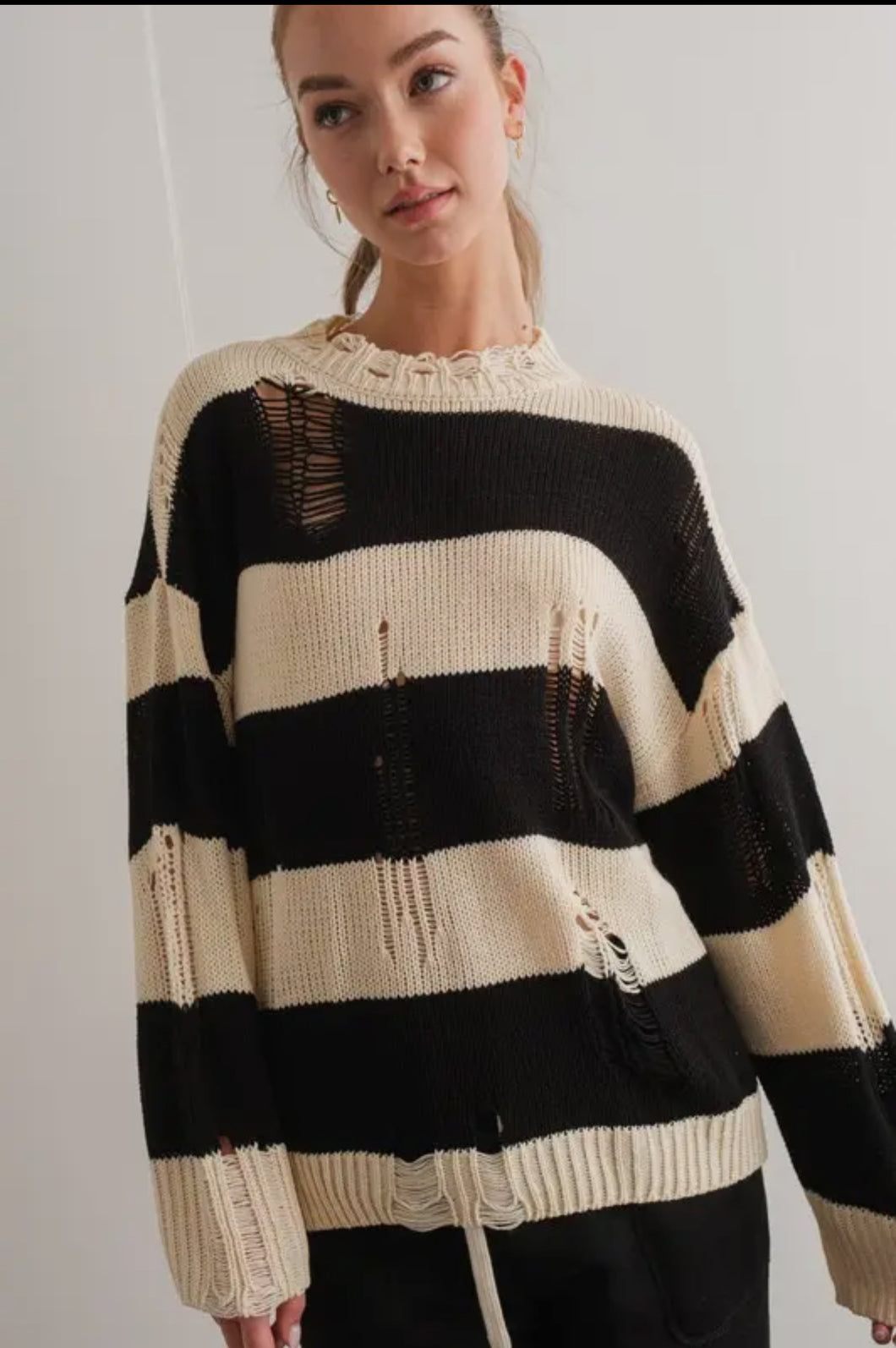 Striped distressed sweater