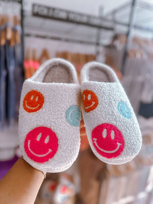 Neon smiley slippers