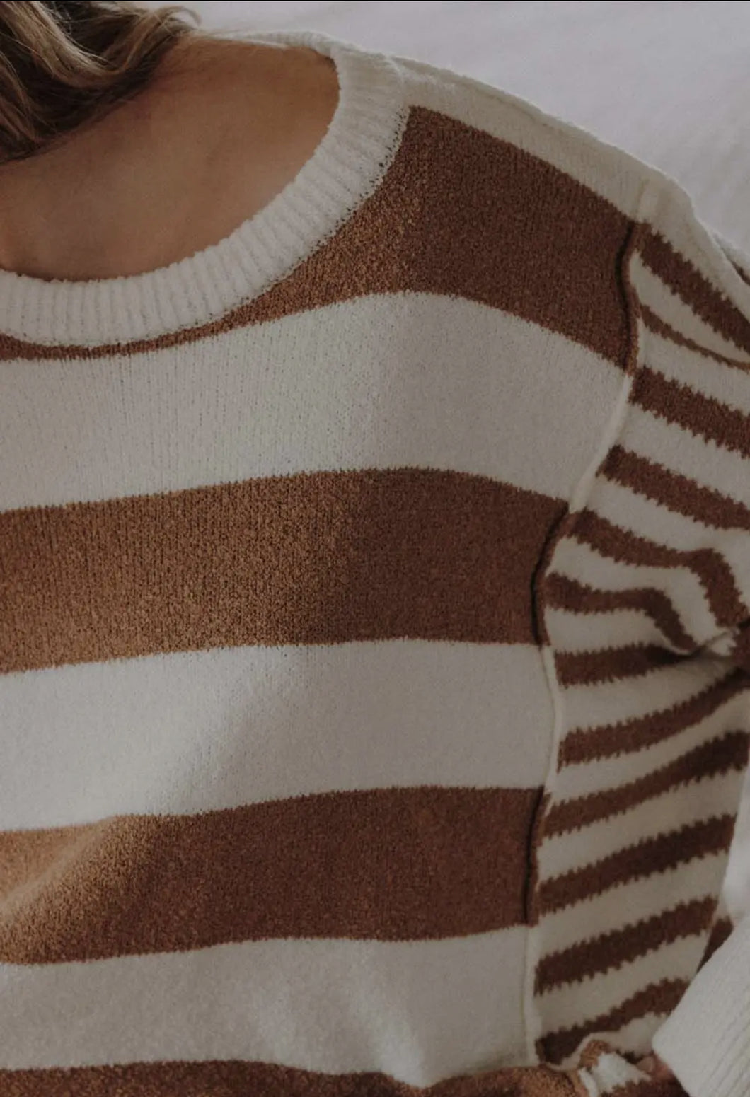 Textured exposed seam striped sweater