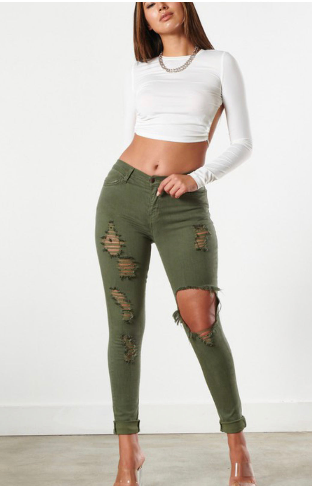 Green distressed jeans.